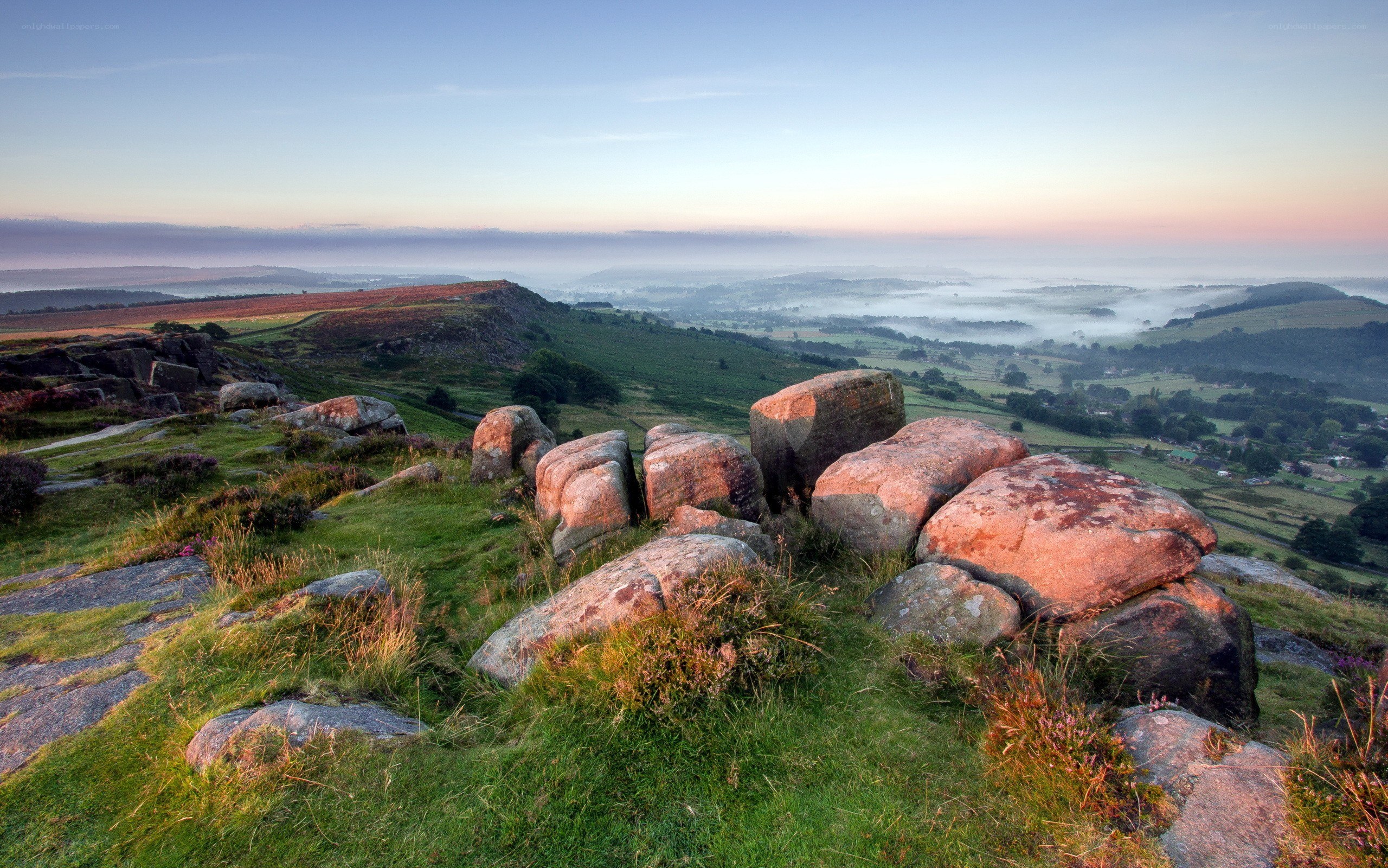 Dawn over rolling hills