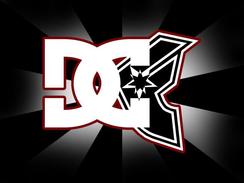 DC Shoes logo on dark background