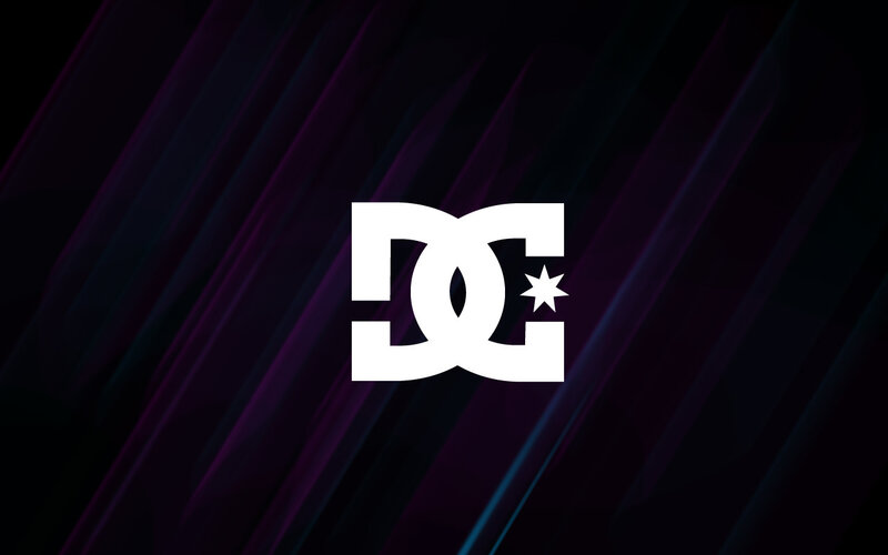 DC Shoes logo on dark background