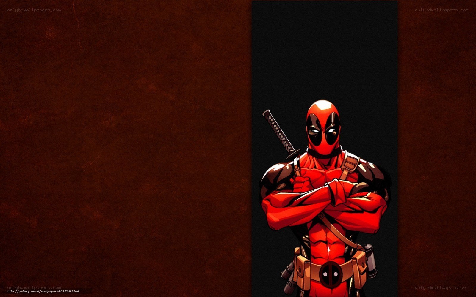 Deadpool standing with arms crossed