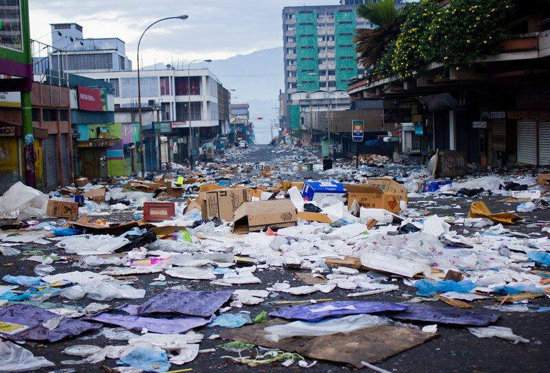 Debris-covered Street — Gray, Desolate