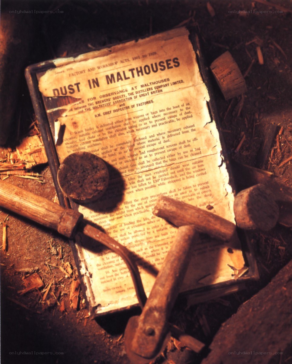 Decaying book on dusty floor