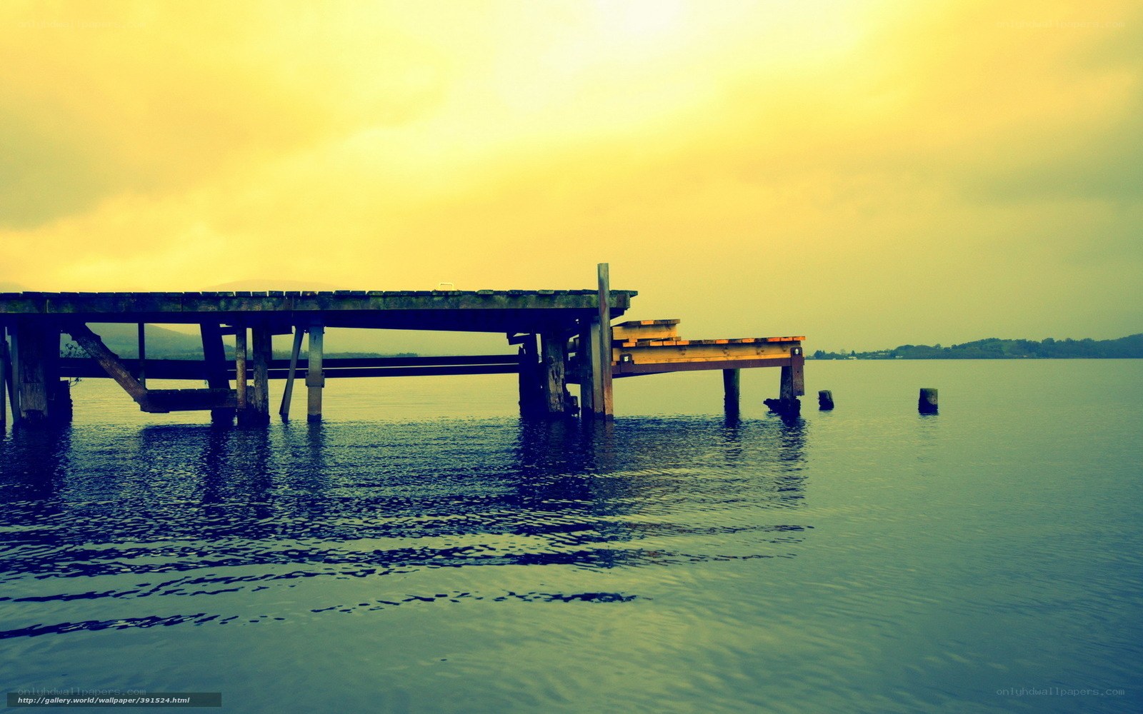Decaying dock at sunset