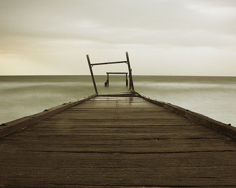 Decaying pier at sea