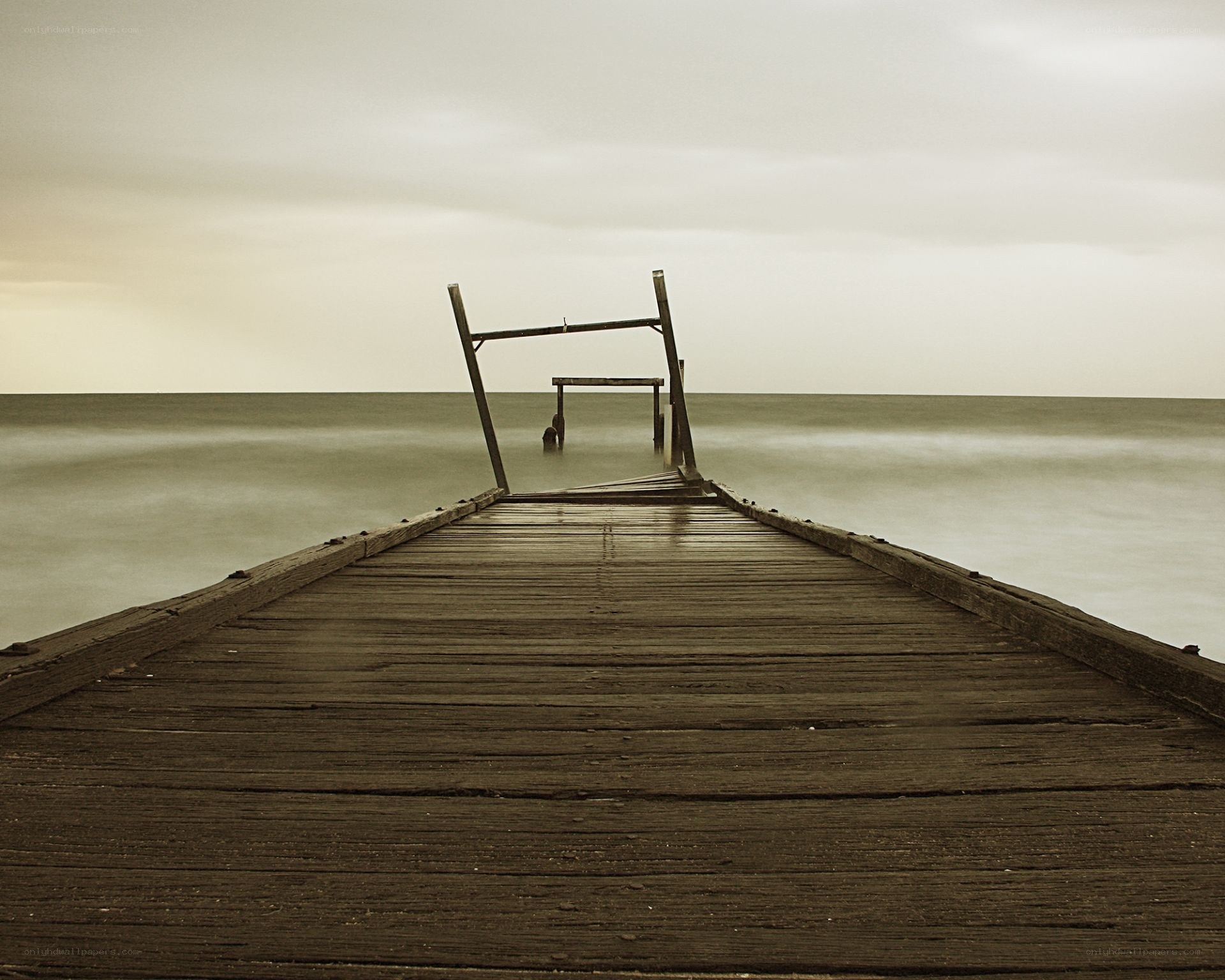 Decaying pier at sea
