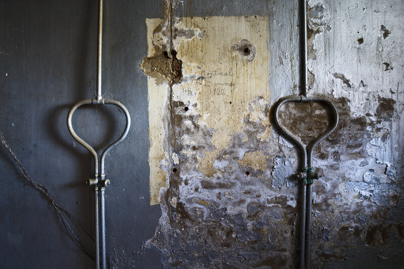 Decaying wall with heart-shaped fixtures