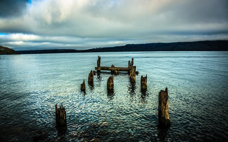 Decaying Wooden Pier — Blue, Dramatic, Afternoon