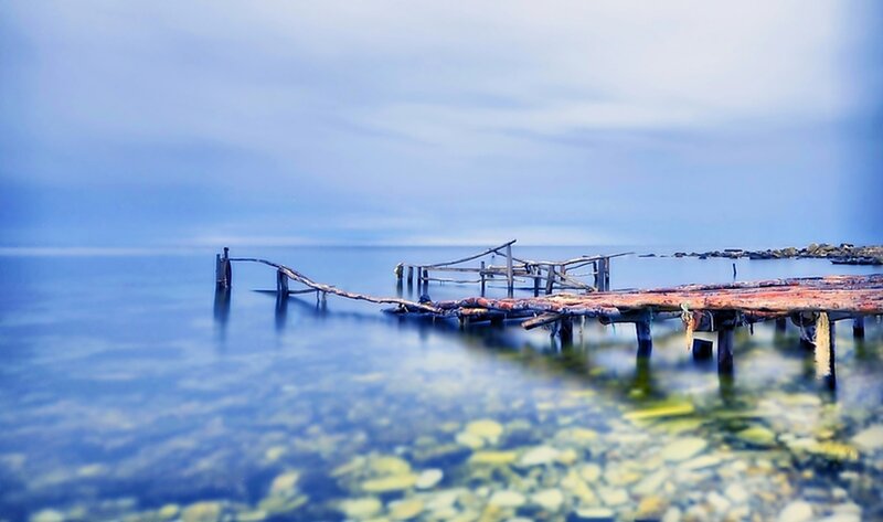 Decaying Wooden Pier — Blue, Serene, Photograph