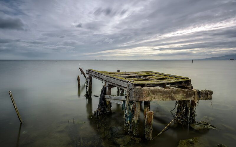 Decaying Wooden Pier — Gray, Somber