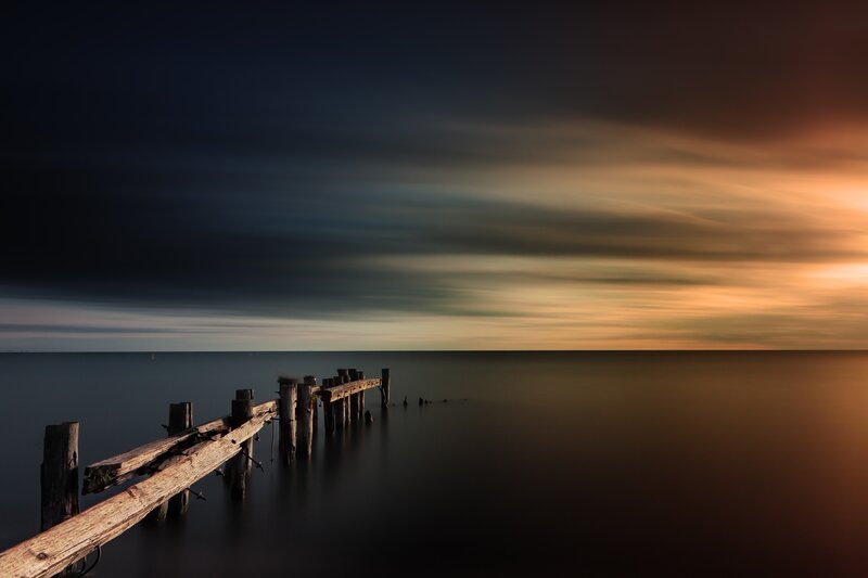 Decaying Wooden Pier — Orange