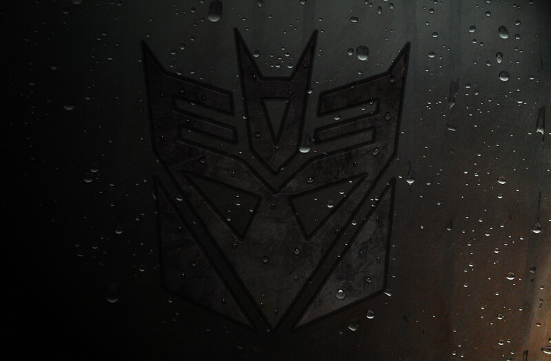 Decepticon logo on wet surface