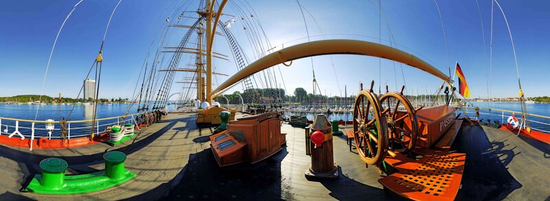 Deck of a tall ship in harbor