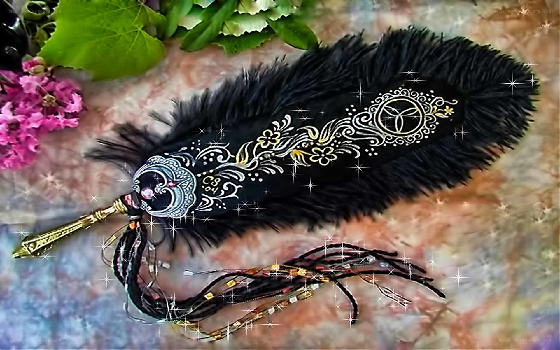 Decorated black feather with tassels