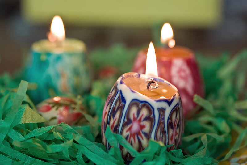 Decorated Candles on Green Paper
