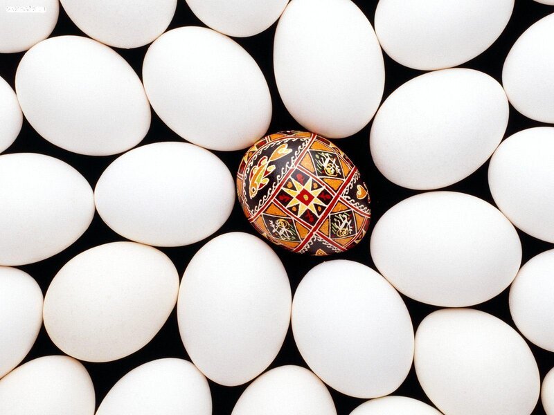 Decorated Egg Among White Eggs