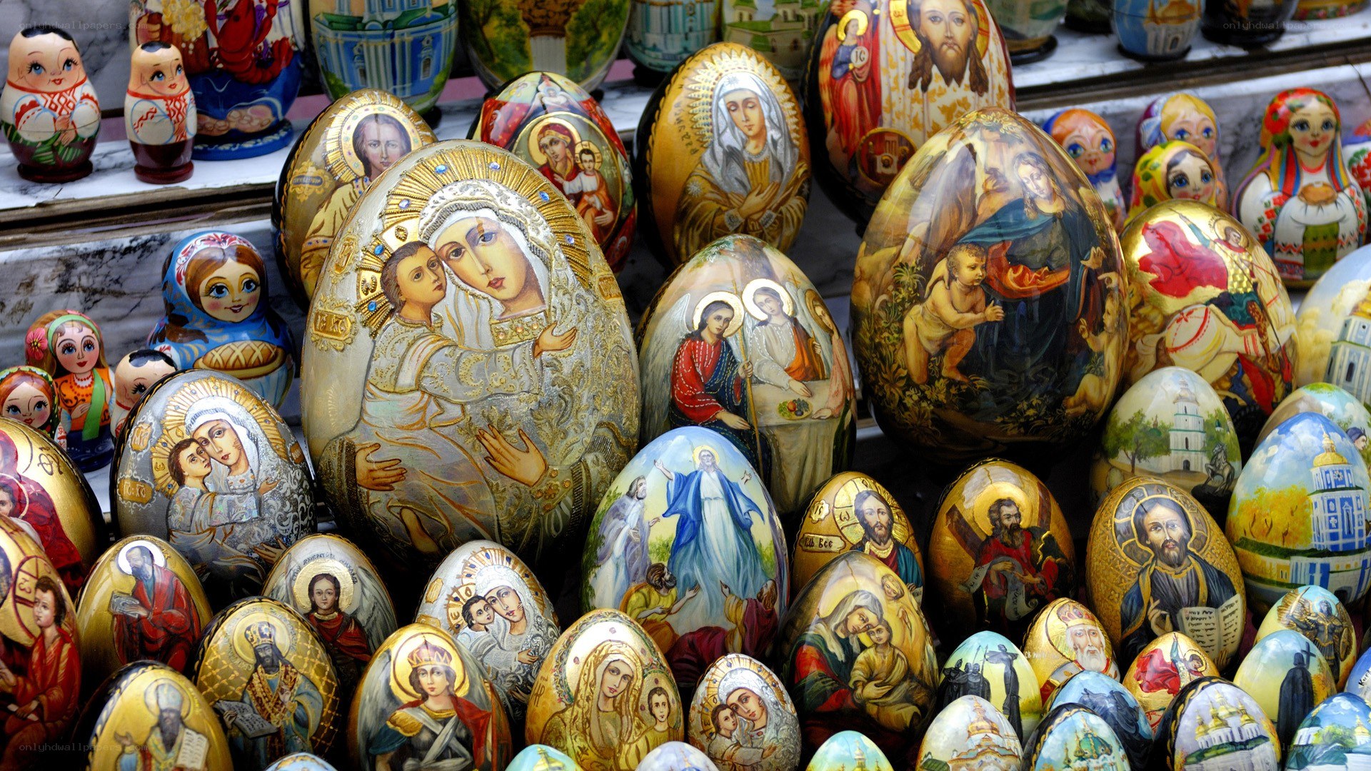 Decorated religious eggs and dolls