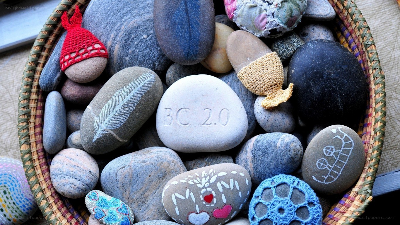 Decorated stones in a basket