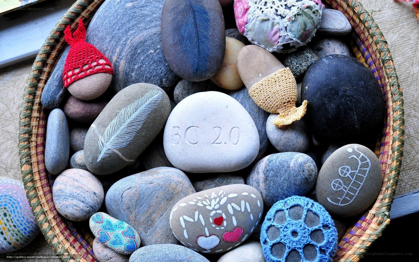 Decorated stones in a basket
