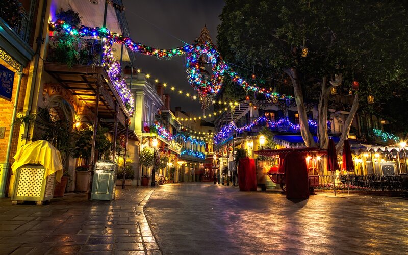 Decorated Street at Night — Blue, Festive, Photograph, Buildings