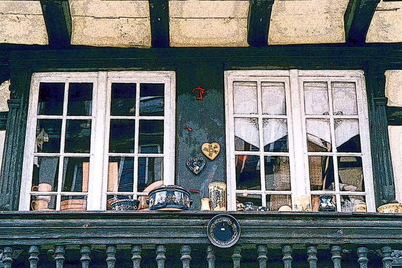decorated windows of a half-timbered house