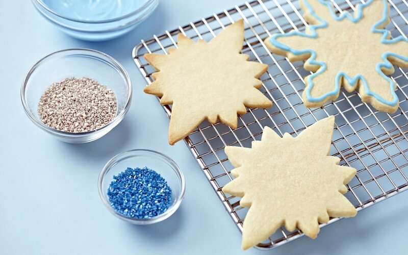 decorating star-shaped cookies
