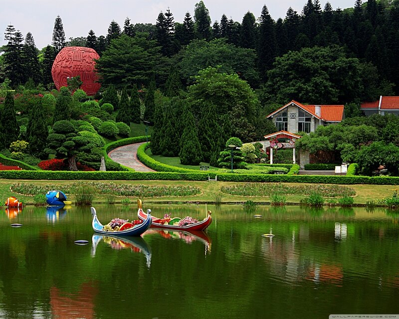 Decorative Boats on Pond — Green, Serene
