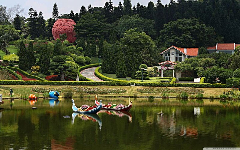 Decorative Boats on Pond