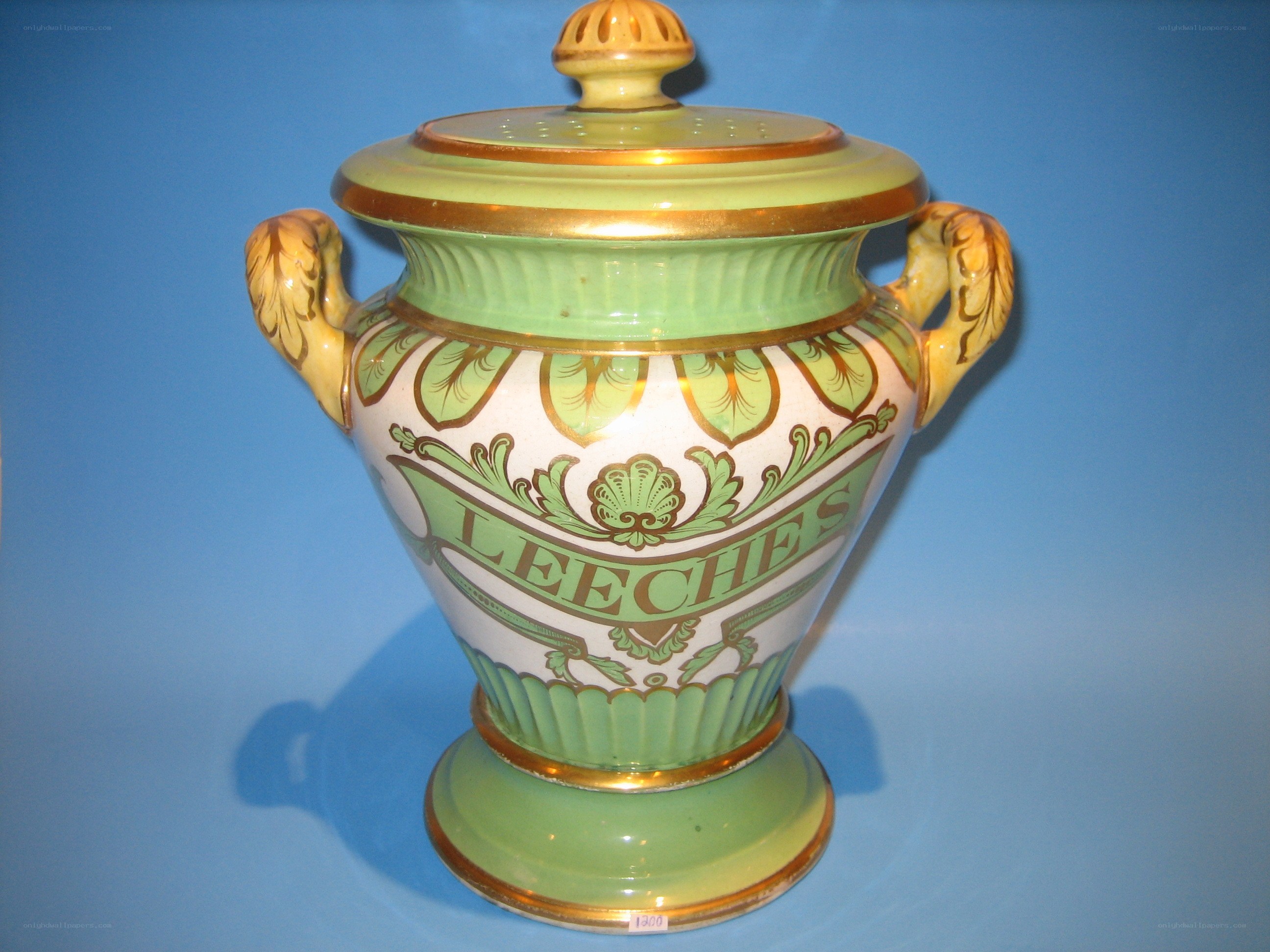 Decorative ceramic urn with lid