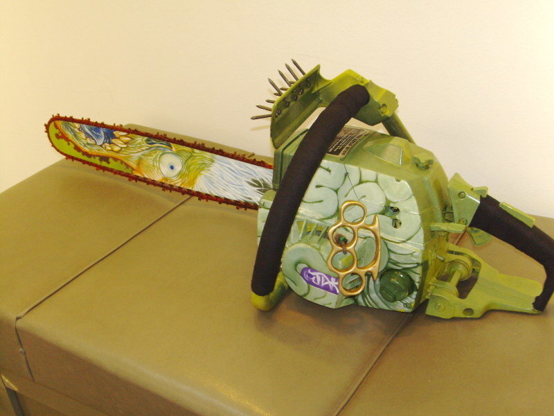 decorative chainsaw with artwork