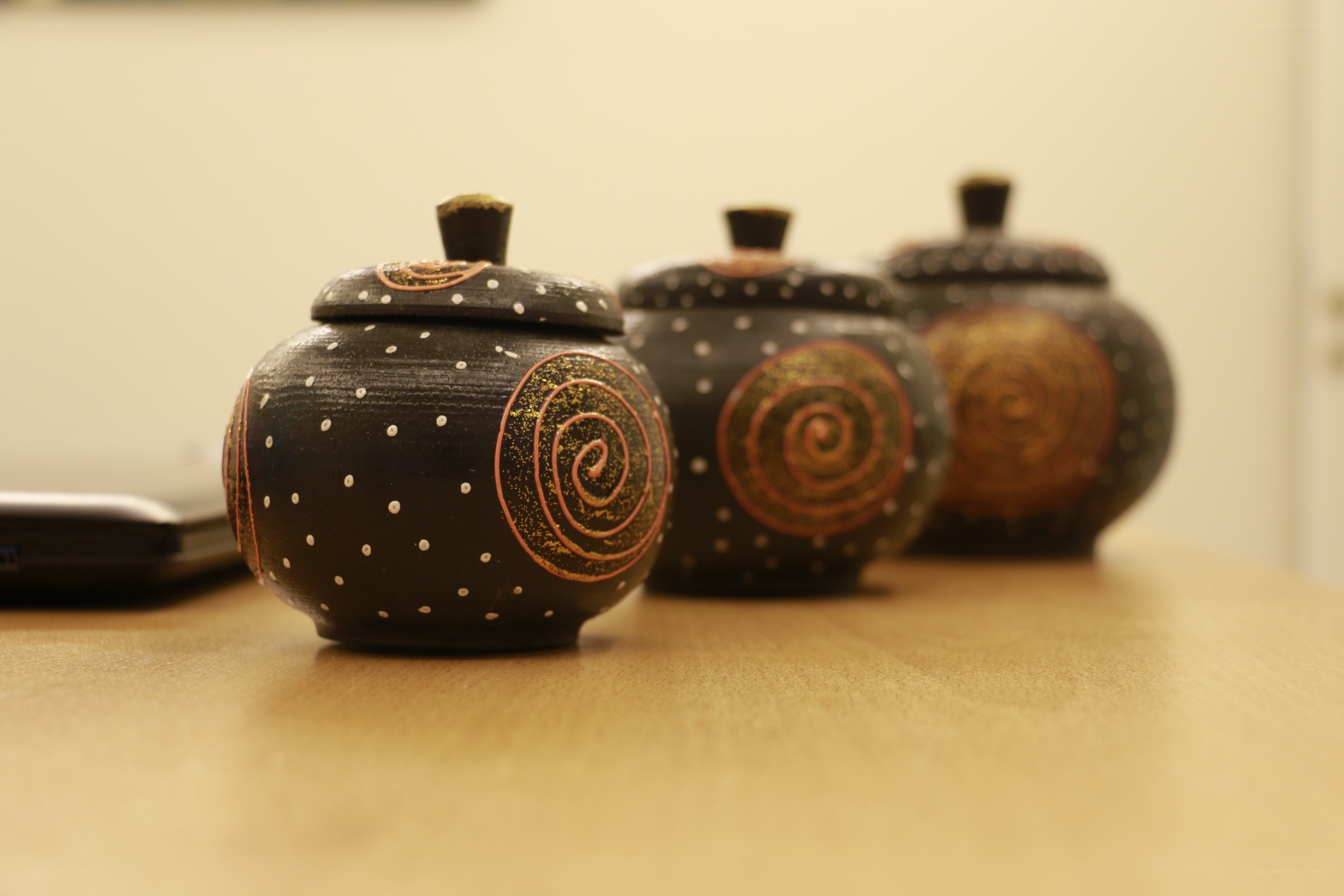 Decorative jars with spiral patterns