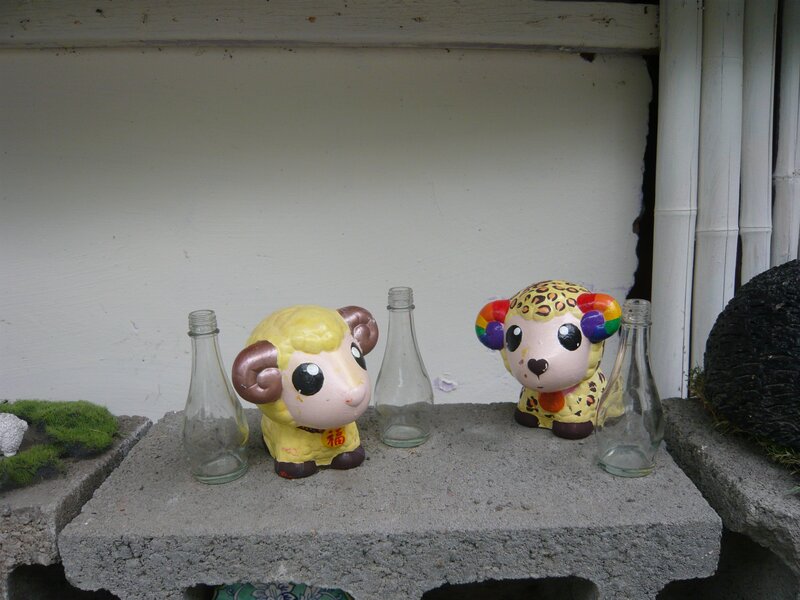 Decorative sheep figurines on concrete