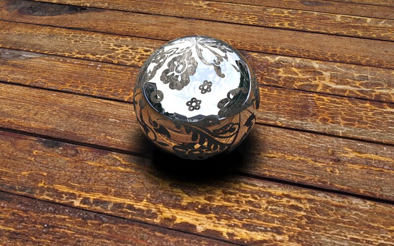 decorative sphere on wood