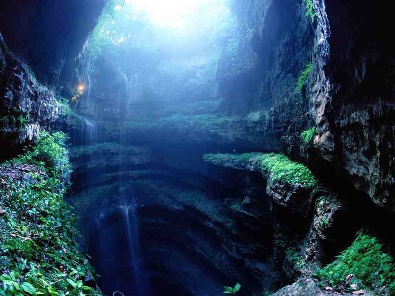 Deep Cave with Waterfall