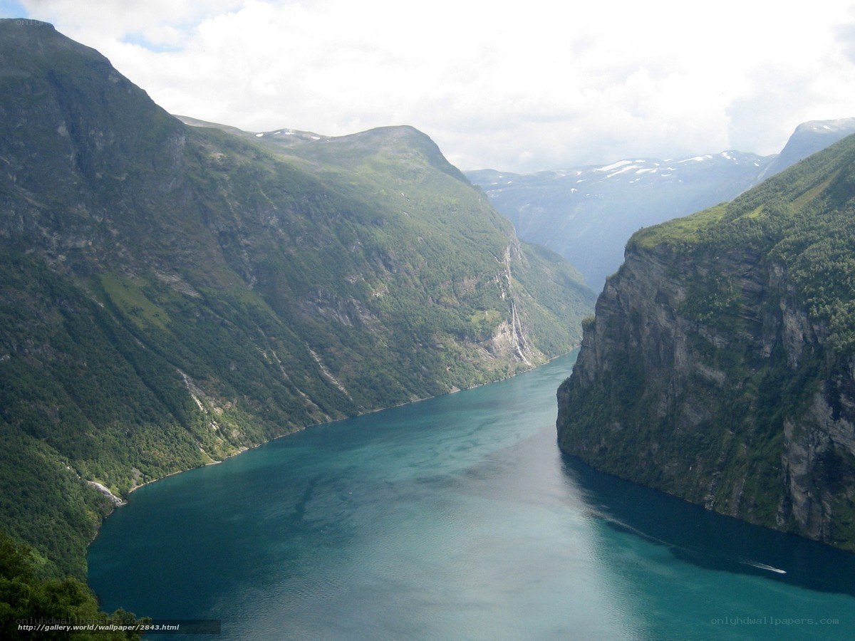 deep fjord between green mountains