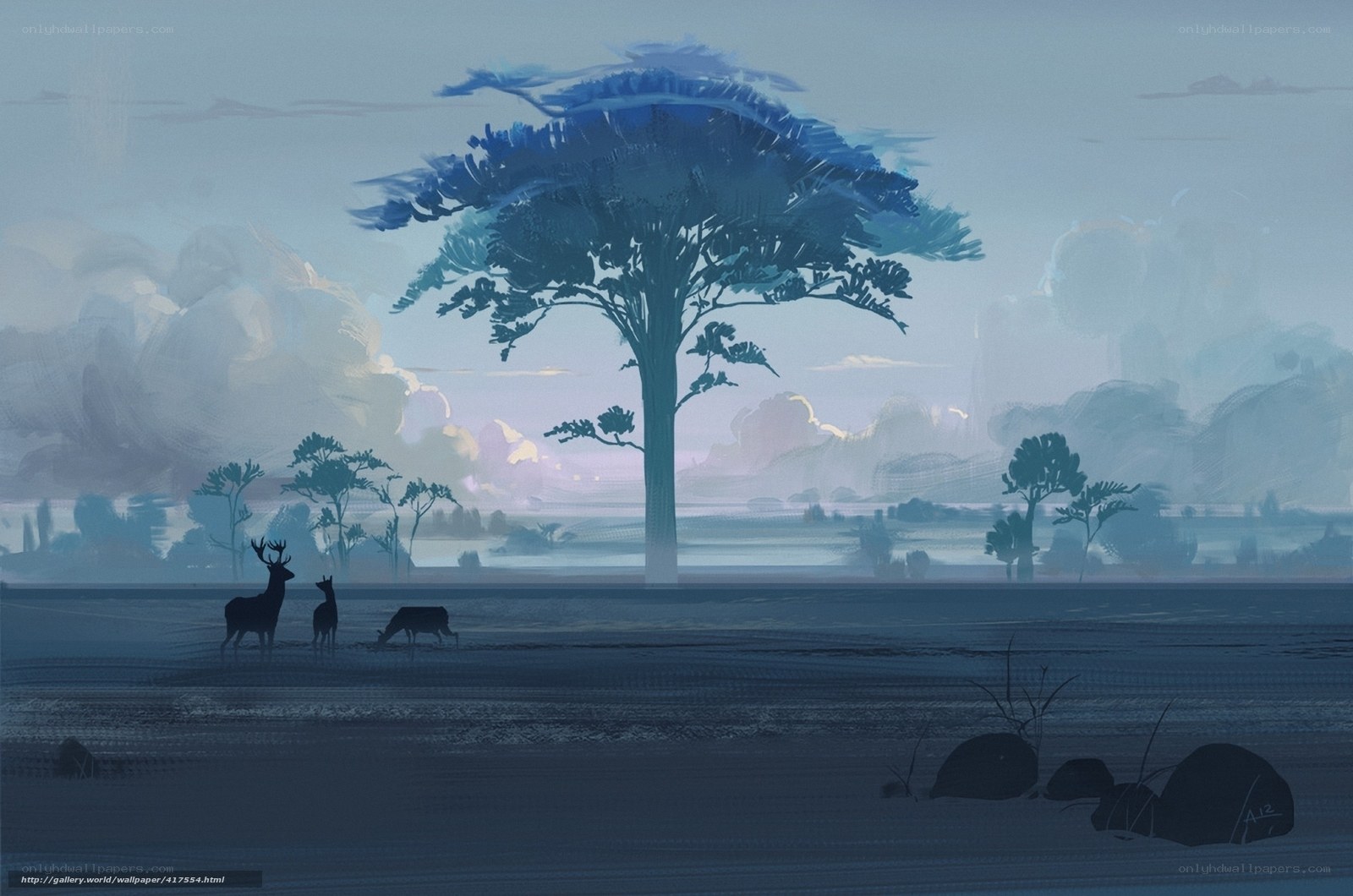Deer under a large tree