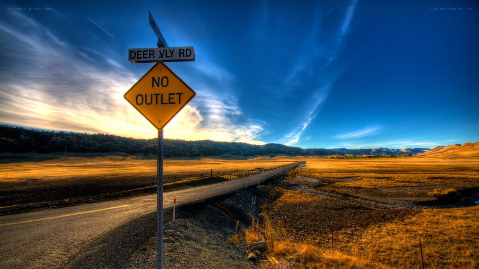 Deer Vly Road sign at sunset