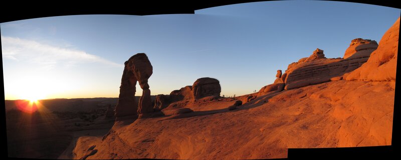 Delicate Arch at Sunset — Orange, Serene, Photograph, Rock Formations, Desert Landscape