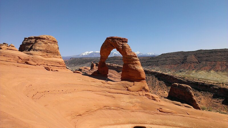 Delicate Arch Formation — Red, Serene, Afternoon