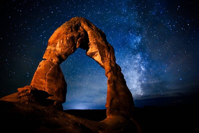 Delicate Arch under starry sky