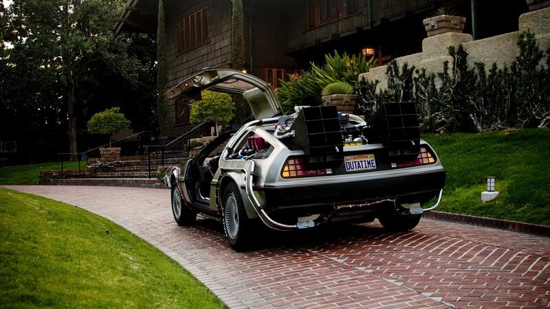 DeLorean Time Machine — Silver, Dramatic, Night, Photograph, Car, House, Brick Driveway, Green