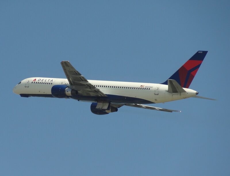 Delta Airplane in Flight — Blue