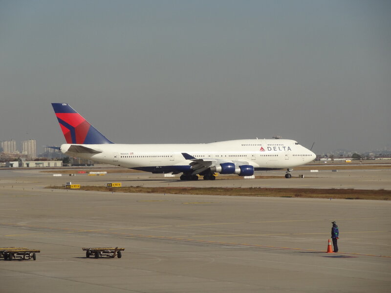 Delta Airplane on Tarmac — White