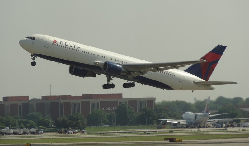 Delta Airplane Taking Off — White, Neutral