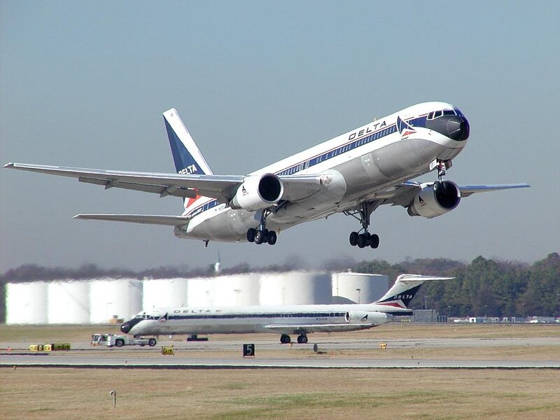 Delta Airplane Taking Off — White