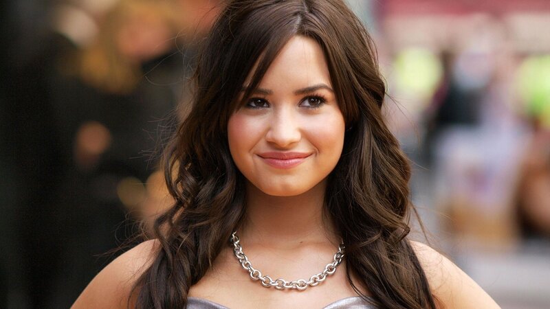 Demi Lovato smiling at event