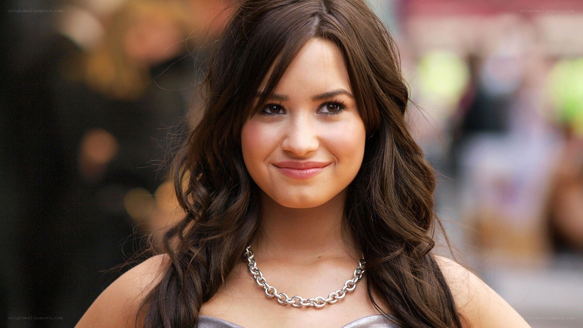 Demi Lovato smiling at event