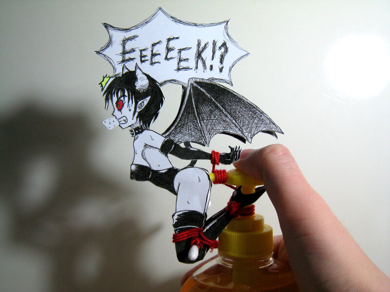 demon character on spray bottle
