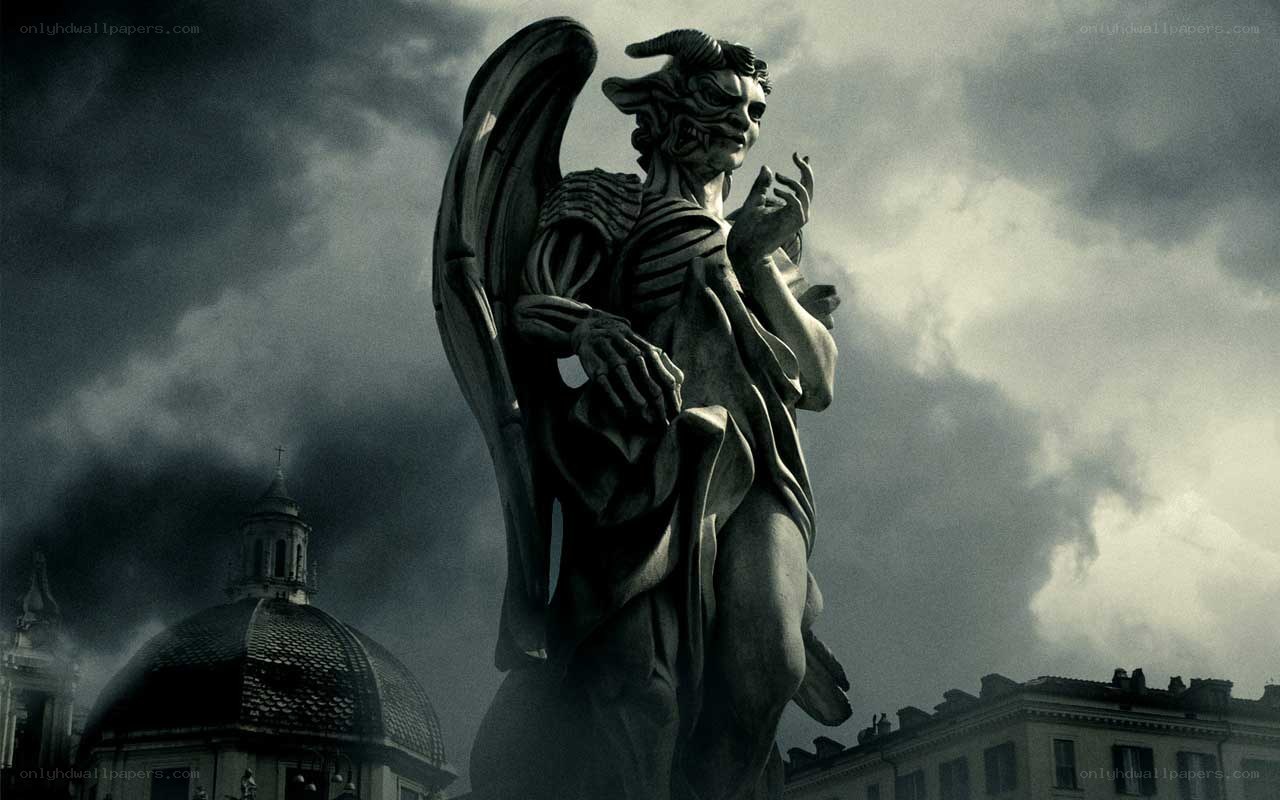 demon statue in stormy sky