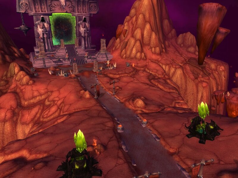 demonic portal in a rocky landscape