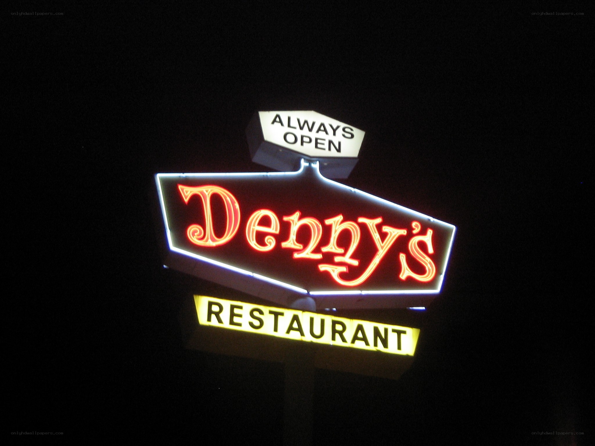 Denny's restaurant sign at night